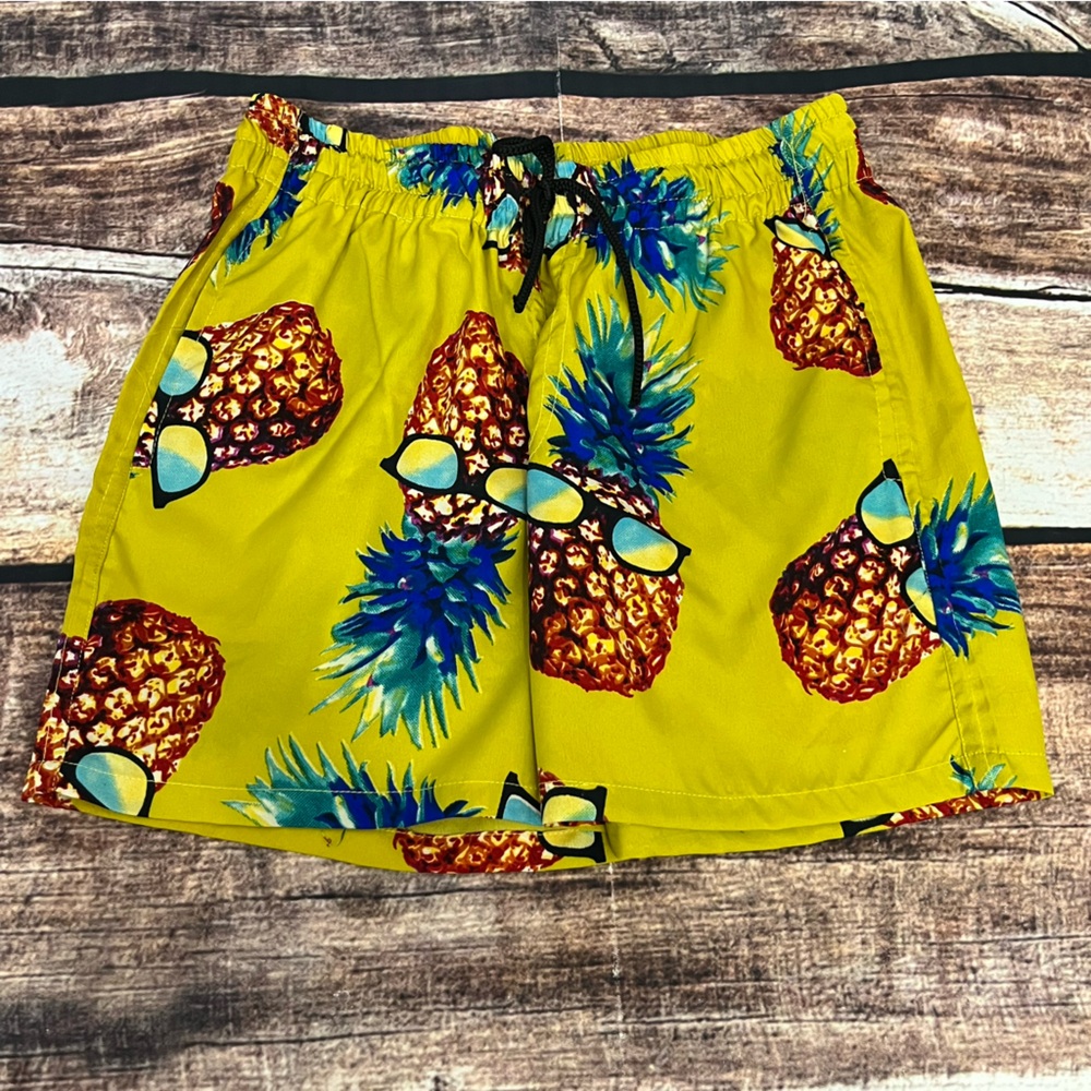 Boys Swim Shorts by Pacific Co are in excellent condition. Size large